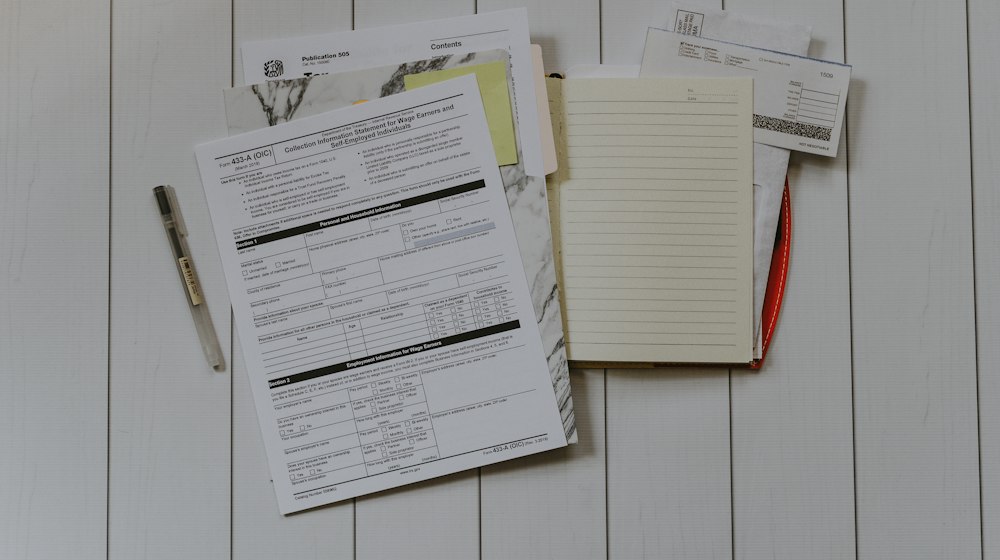 A flat lay of paperwork and documents